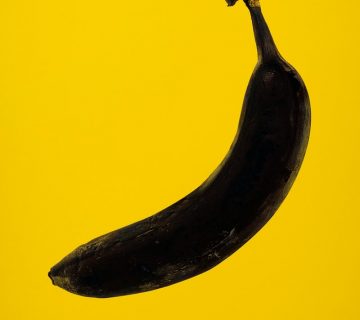 Rotten banana on yellow background 3600078 360x320