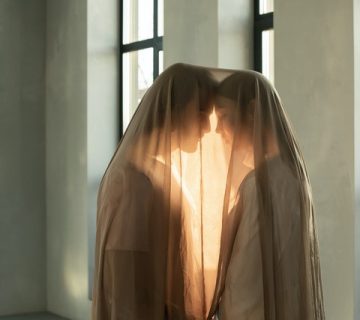 Couple covered in sheer fabric 3754298 360x320