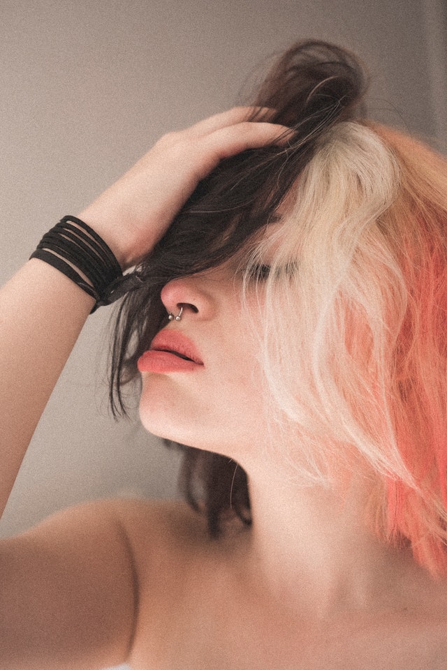 Woman touching her hair 3979460