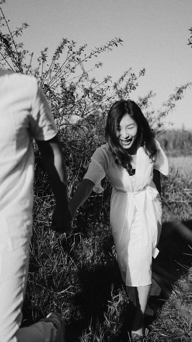 Happy asian woman walking with boyfriend in countryside 3088160