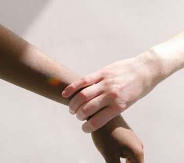 Holding a hand by the wrist 4557403 360x320